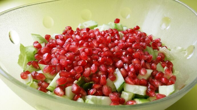 Fresh Salad with Pomegranate Seeds and Brie Cheese